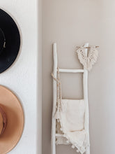 Load image into Gallery viewer, White mini fringe wall hanging made up of cotton cord hand knotted on driftwood hanging on a ladder
