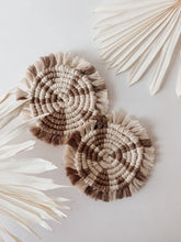 Load image into Gallery viewer, Two white and beige macrame coasters
