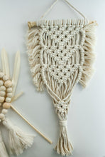 Load image into Gallery viewer, A macrame air plant wall hanger with fringe detailing
