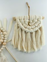 Load image into Gallery viewer, Chunky semi lunar macrame wall hanging with a crescent moon charm handed on driftwood 
