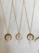 Load image into Gallery viewer, Three gold plated chain necklaces with gold plated crescent and clear quartz charms 
