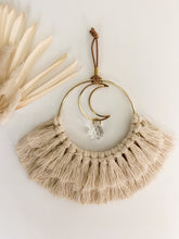 Load image into Gallery viewer, A macrame sun catcher with gold crescent charm and fringe detailing
